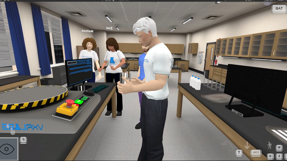 Teacher and student avatars at computers and lab benches in a VXRLabs virtual lab